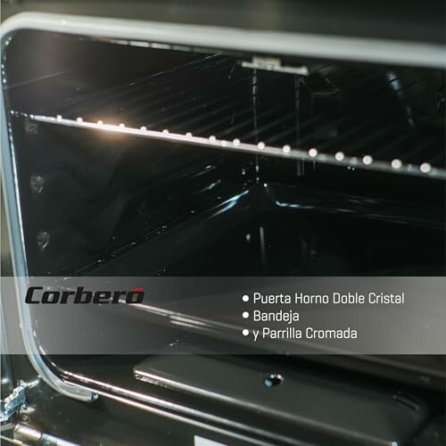 Interior de un horno con puerta de doble cristal, bandeja y parrilla cromada.